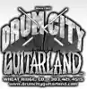 drumcityguitarland.com